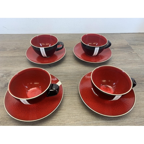 381 - Four Rocha John Rocha Pico Red stoneware teacups and saucers