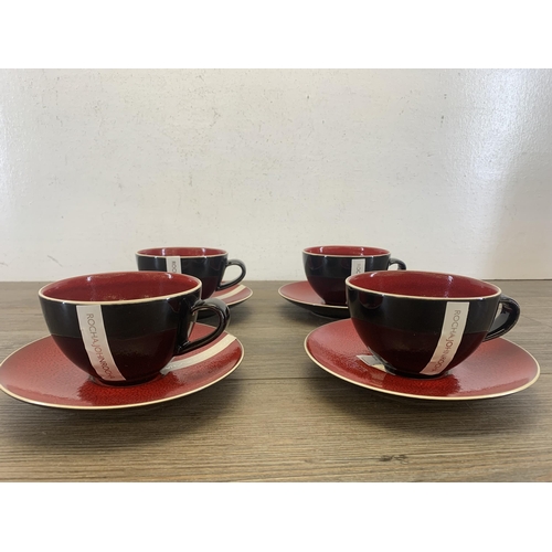 381 - Four Rocha John Rocha Pico Red stoneware teacups and saucers