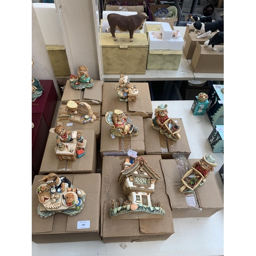 390 - Nine boxed Pendelfin items, one Cottage display stand and eight rabbit figurines to include Gramps, ... 