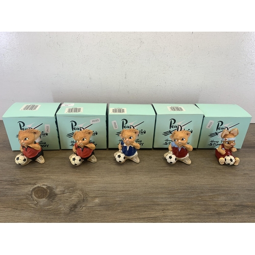 392 - Five boxed Pendelfin rabbit footballer figurines, four Striker and one Wannabe