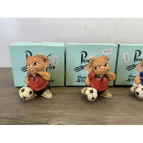 392 - Five boxed Pendelfin rabbit footballer figurines, four Striker and one Wannabe