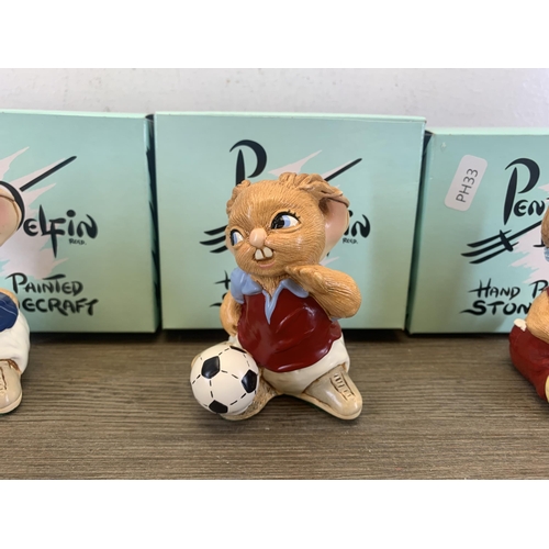 392 - Five boxed Pendelfin rabbit footballer figurines, four Striker and one Wannabe