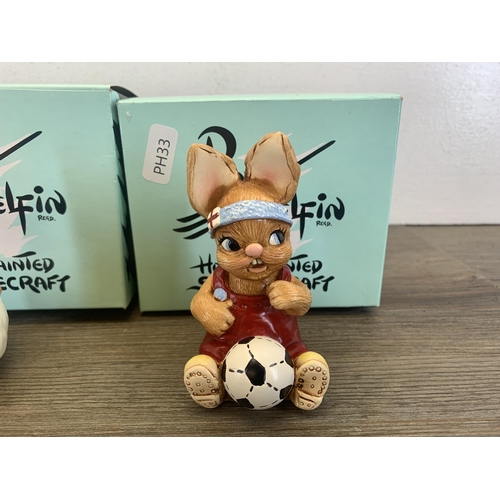 392 - Five boxed Pendelfin rabbit footballer figurines, four Striker and one Wannabe