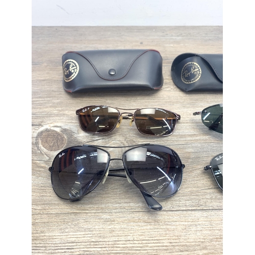 466 - Six pairs of sunglasses to include five Ray-Ban together with two Ray-Ban black leather cases