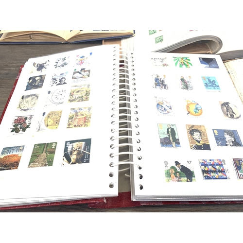 486 - Five albums containing a collection of worldwide stamps