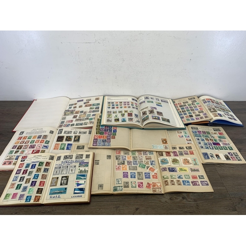 487 - Twelve albums containing a collection of worldwide stamps