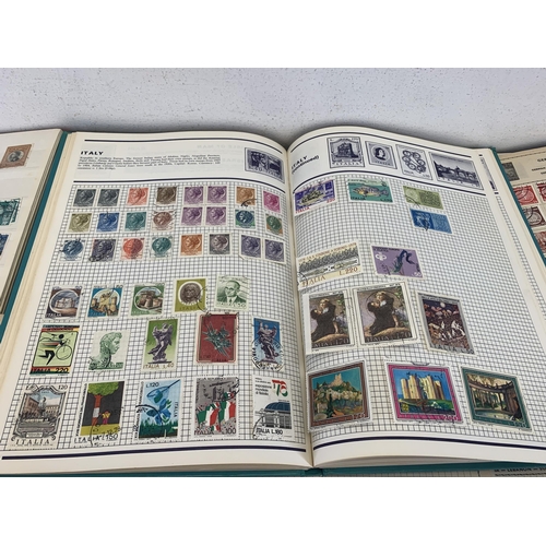 487 - Twelve albums containing a collection of worldwide stamps