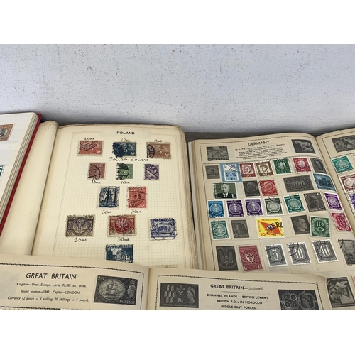 487 - Twelve albums containing a collection of worldwide stamps