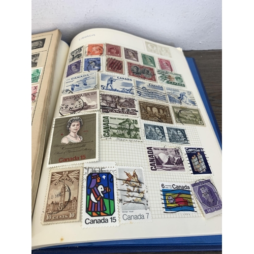 487 - Twelve albums containing a collection of worldwide stamps