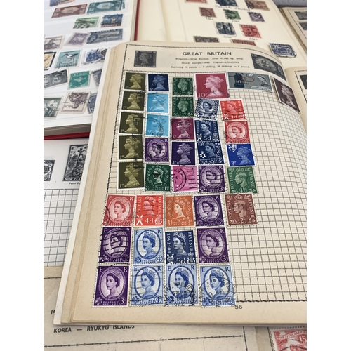 487 - Twelve albums containing a collection of worldwide stamps