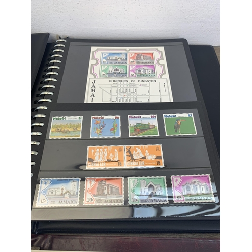 488 - Four albums containing a collection of worldwide stamps