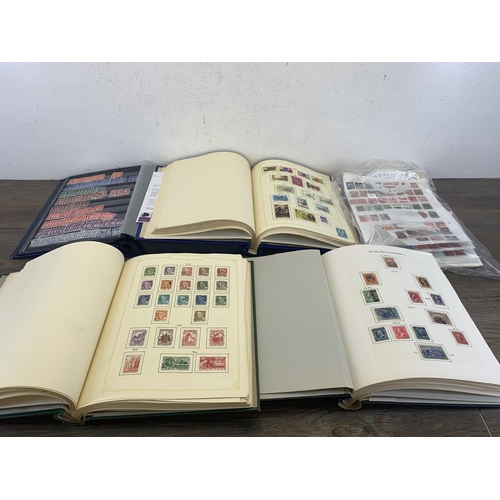 492 - Four albums containing a collection of worldwide stamps