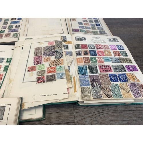 499 - Seven albums containing a collection of worldwide stamps