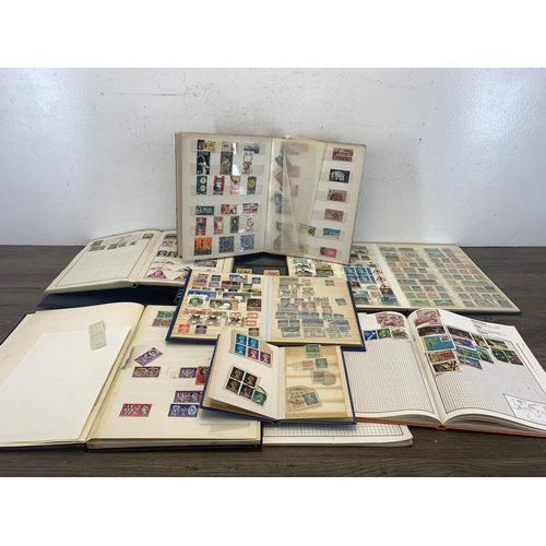 500 - Seven albums and two stock books containing a collection of worldwide stamps