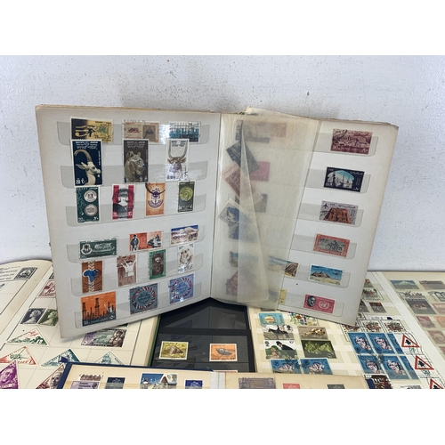 500 - Seven albums and two stock books containing a collection of worldwide stamps