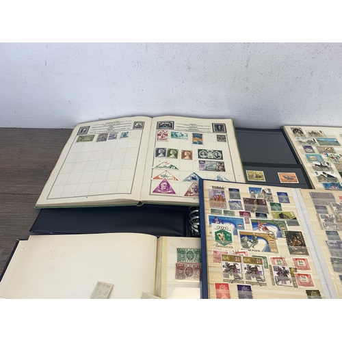 500 - Seven albums and two stock books containing a collection of worldwide stamps