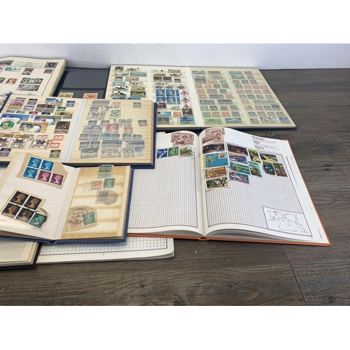 500 - Seven albums and two stock books containing a collection of worldwide stamps