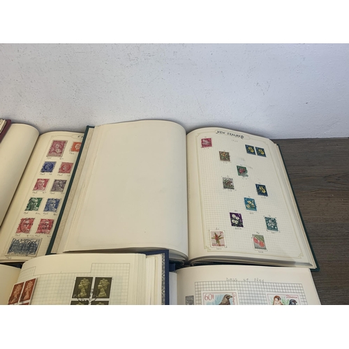 501 - Seven albums containing a collection of worldwide stamps