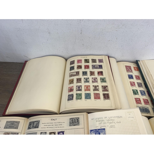 501 - Seven albums containing a collection of worldwide stamps