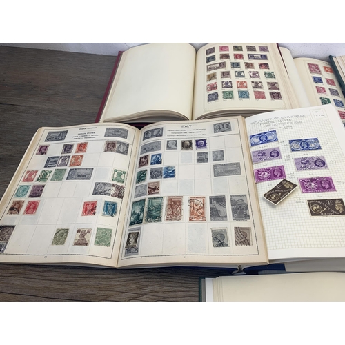 501 - Seven albums containing a collection of worldwide stamps