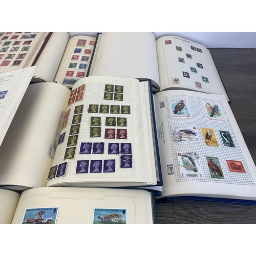 501 - Seven albums containing a collection of worldwide stamps