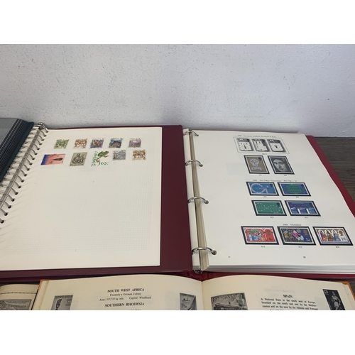 502 - Six albums containing a collection of worldwide stamps