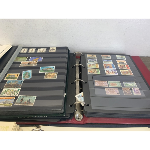 503 - Five stamp albums containing a collection of worldwide stamps