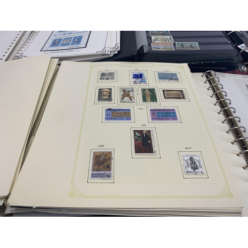 503 - Five stamp albums containing a collection of worldwide stamps