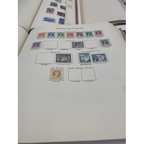 505 - Five albums containing a collection of worldwide stamps