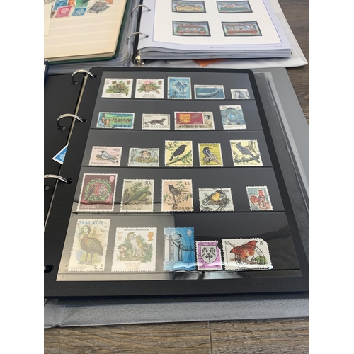 506 - Five albums containing a collection of worldwide stamps