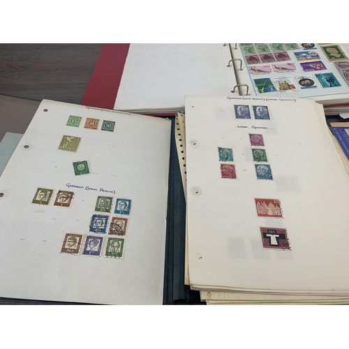 507 - Four albums and two stock books containing a collection of worldwide stamps