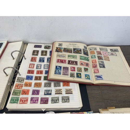 507 - Four albums and two stock books containing a collection of worldwide stamps