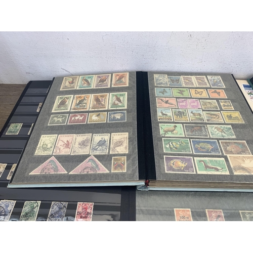 509 - Seven albums containing a collection of worldwide stamps