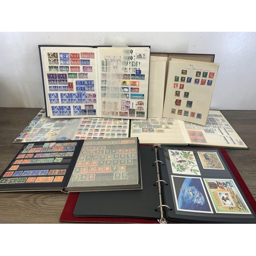 511 - Six albums containing a collection of worldwide stamps