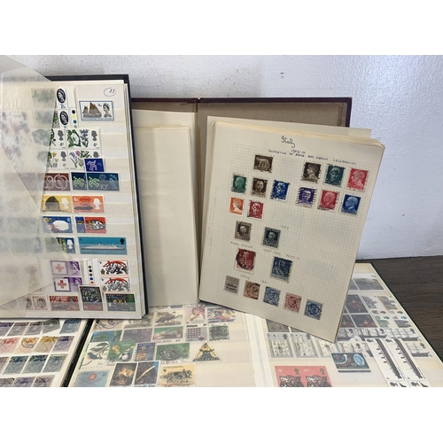 511 - Six albums containing a collection of worldwide stamps