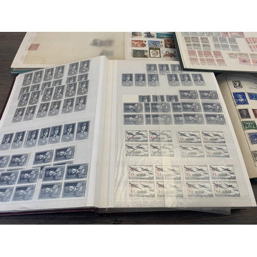 513 - Six albums containing a collection of worldwide stamps