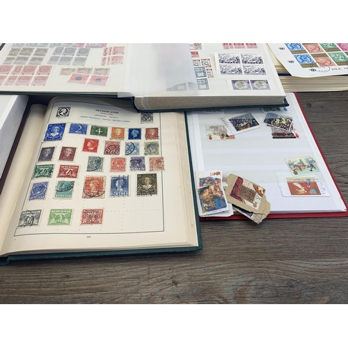 513 - Six albums containing a collection of worldwide stamps