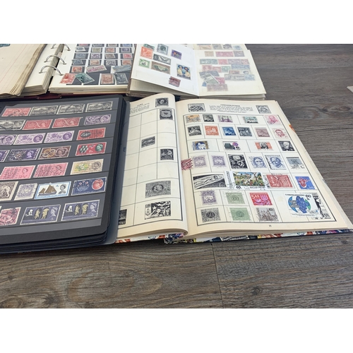 515 - Five albums and two stock books containing a collection of worldwide stamps