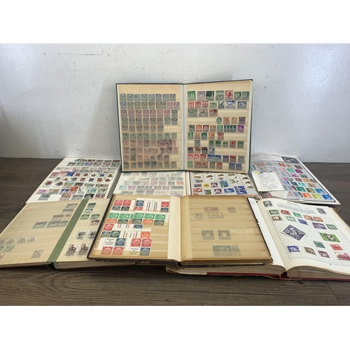 516 - Seven albums containing a collection of worldwide stamps