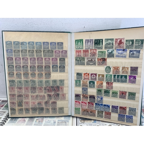 516 - Seven albums containing a collection of worldwide stamps