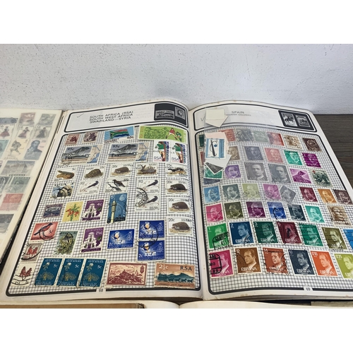 516 - Seven albums containing a collection of worldwide stamps