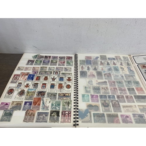 516 - Seven albums containing a collection of worldwide stamps