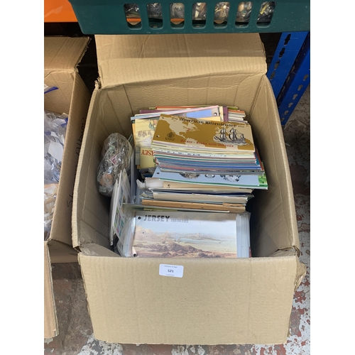 521 - A box containing a large quantity of loose stamps and first day covers