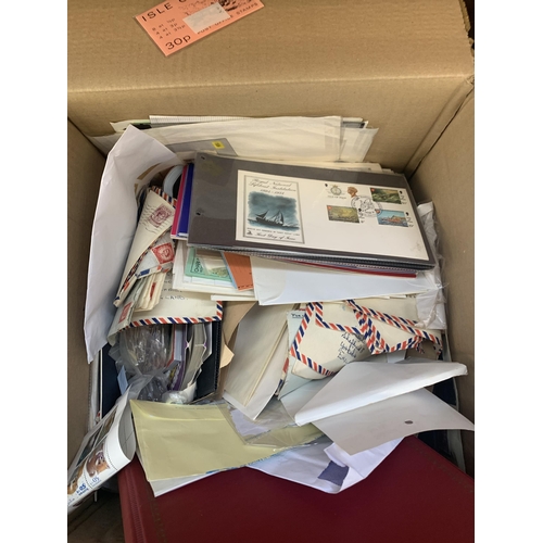 524 - A box containing a large quantity of loose stamps and first day covers