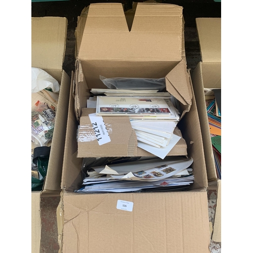 526 - A box containing a large quantity of loose stamps and first day covers