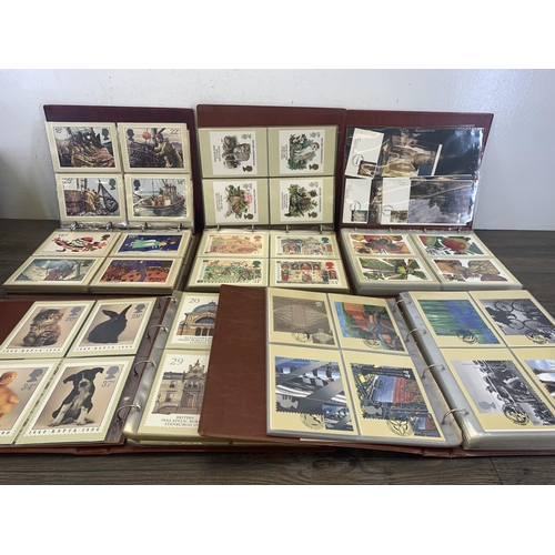 530 - Five albums containing a collection of Royal Mail postcards