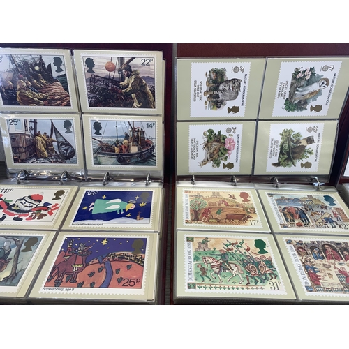 530 - Five albums containing a collection of Royal Mail postcards