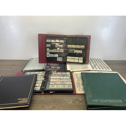 533 - Seven albums containing a collection of worldwide stamps