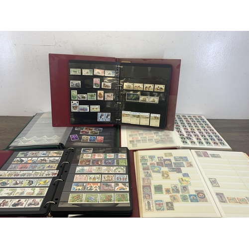 533 - Seven albums containing a collection of worldwide stamps