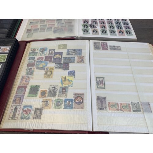 533 - Seven albums containing a collection of worldwide stamps